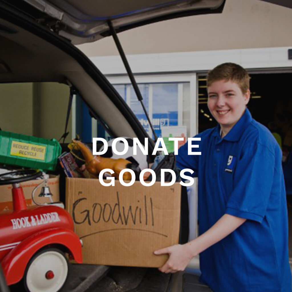 Donate Goods Button. Picture of male employee with a donation box.